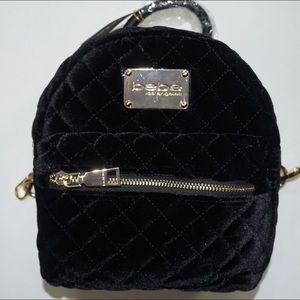 Black mini suede pelted Bebe bag